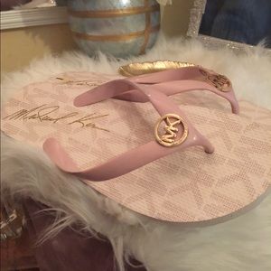 Mk woman’s flip flops size 11